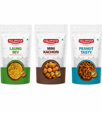 Three stand-up pouches of Zelawati Jhugga Chodapki (deep-fried snacks) arranged side-by-side on a white background. The packages are labeled 'ZELAWATJI LAUNG SEV', 'ZELAWATJI MINI KACHORI', and 'ZELAWATJI PEANUT TASTY', with green, brown, and blue color blocks at the bottom showing the food inside.